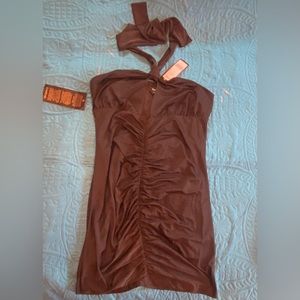 NWT Bebe ruched halter mini dress. Size XL, runs small. Cut out at chest.